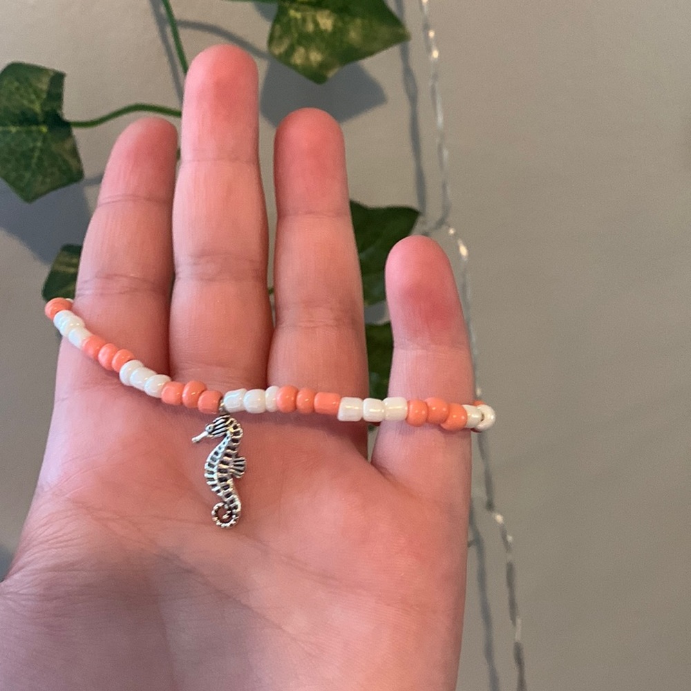 Coral and shimmer white bead bracelet